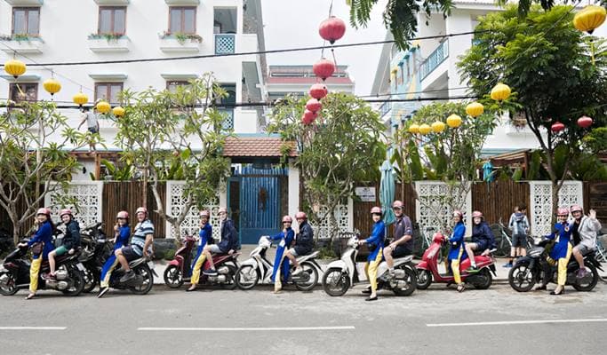 Hoi An Street Food Private Motorbike Tour with Driver Wearing Vietnam Traditional Attire - main view